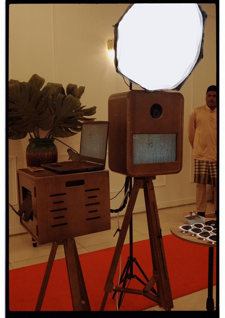 The photobooth setup and printing station at a venue