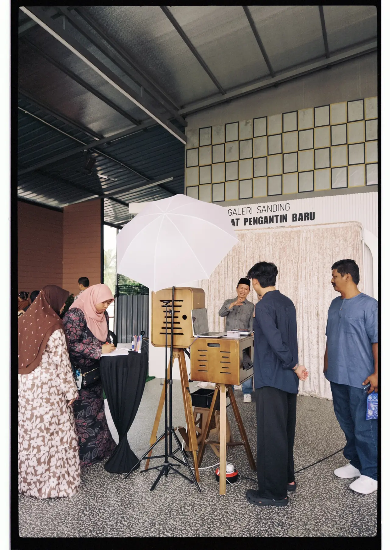 Guests collecting their printed photostrips