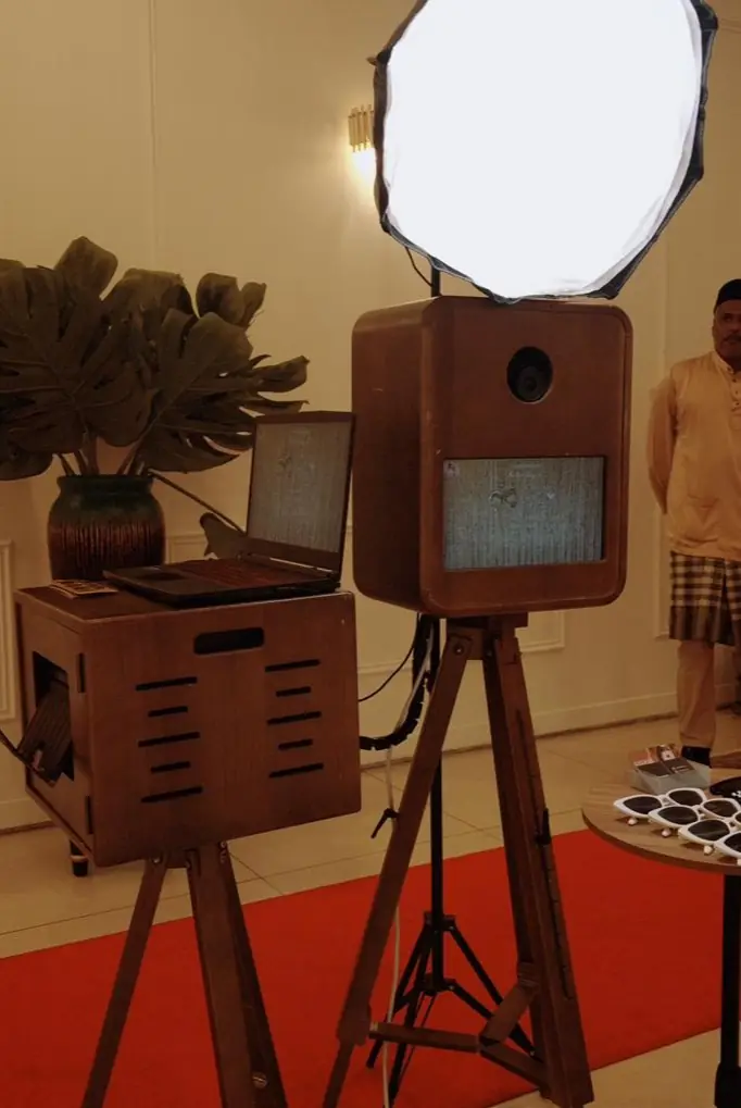 The photobooth setup and printing station at a venue