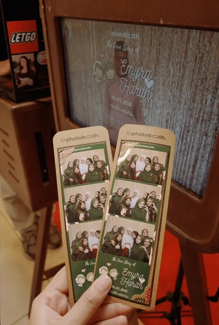Custom-designed wedding photostrip with the couple's names